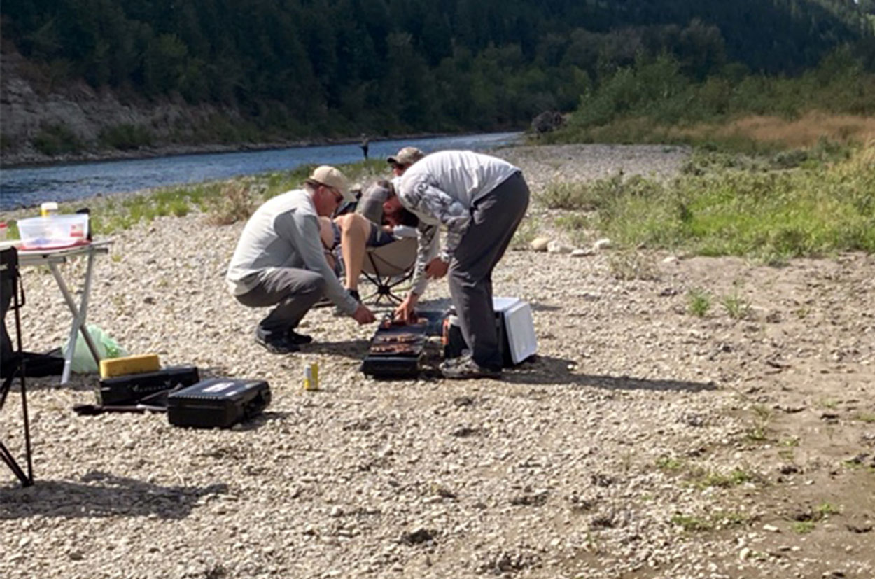 corporate fly fishing trip bbq bow river alberta