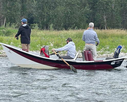 drift boat fly fishing group bow river