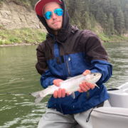 beginner fly fishing lessons on a drift boat on the bow river with George.