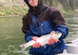 beginner fly fishing lessons on a drift boat on the bow river with George.