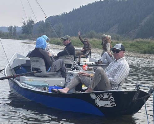 Guided Bow River drift boats taking a break during a full-day fishing trip.